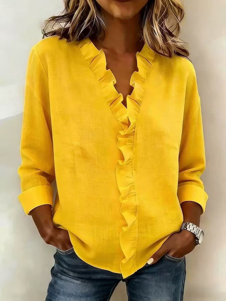 Chiara | Blusa con cuello en V y volantes delicados